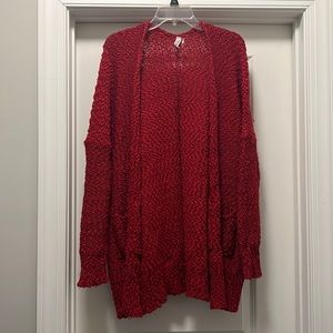 Cozy, red popcorn sweater with pockets